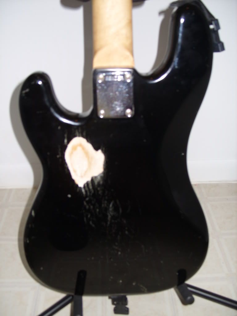 A question about scratching your guitar with your belt buckle