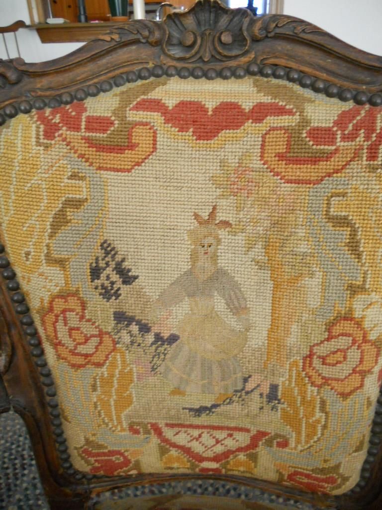 Antique French Needlepoint Arm Chair with Elegant Carved Wooden Frame